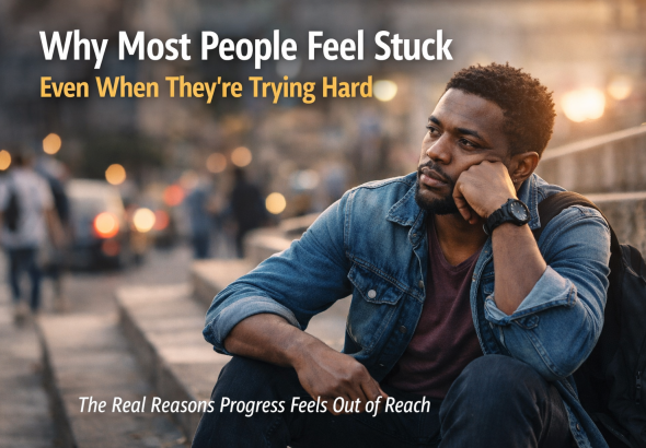 Thoughtful young African man sitting on urban steps at dusk, looking ahead as city lights blur in the background, representing feeling stuck despite effort.